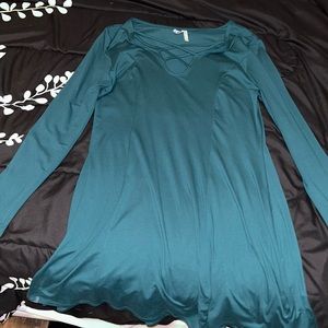 Turquoise long sleeve dress with criss cross neckline